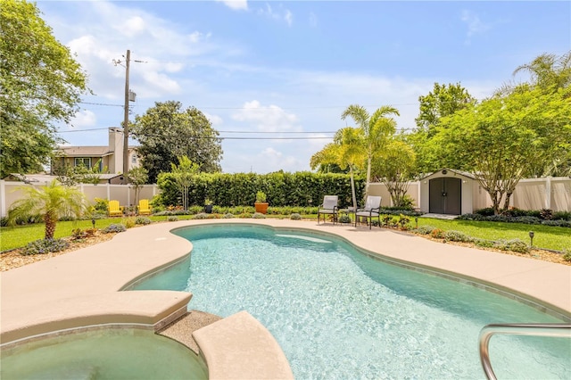 2548 E Compton St, Orlando, FL 32806 - view of pool with a storage unit, a fenced backyard, a fenced in pool, an outbuilding, and a patio