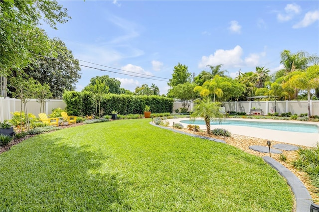 2548 E Compton St, Orlando, FL 32806 - view of yard with a fenced backyard and a fenced in pool