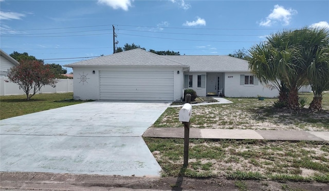 1077 Willow Wood Dr, Port Orange, FL 32129 - single story home with brick siding, a garage, concrete driveway, and roof with shingles