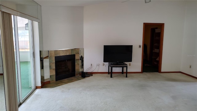 1077 Willow Wood Dr, Port Orange, FL 32129 - living area with carpet floors and a fireplace