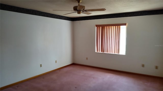 1077 Willow Wood Dr, Port Orange, FL 32129 - spare room with carpet and a ceiling fan