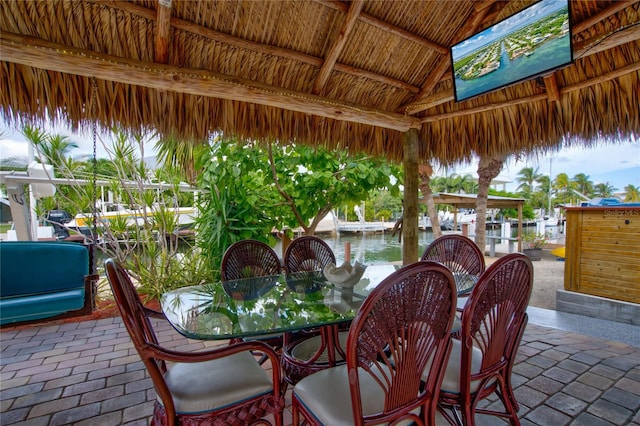 view of patio / terrace featuring a gazebo and outdoor dining area