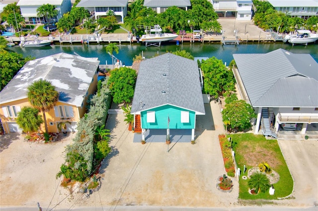 aerial view with a water view and a residential view
