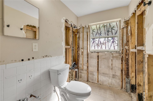 431 Palmetto St, Edgewater, FL 32132 - bathroom featuring toilet and tile walls