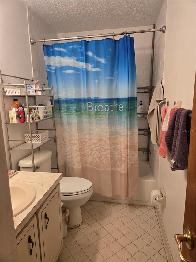 full bathroom with a textured ceiling, tile patterned floors, vanity, toilet, and shower / tub combo with curtain