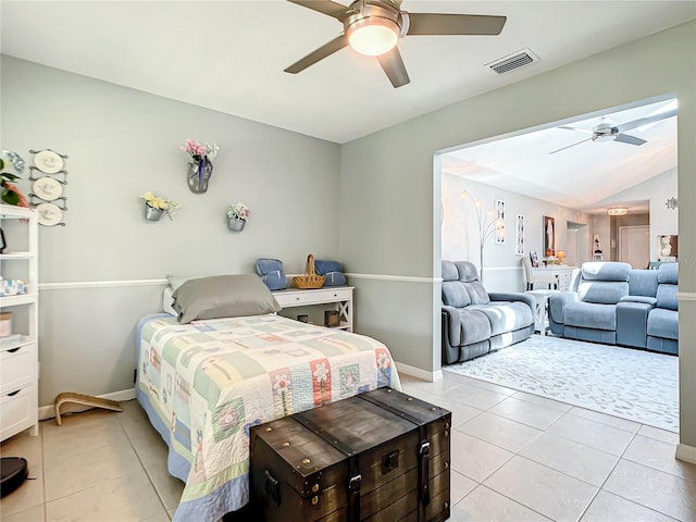 bedroom featuring visible vents, baseboards, ceiling fan, and light tile patterned floors