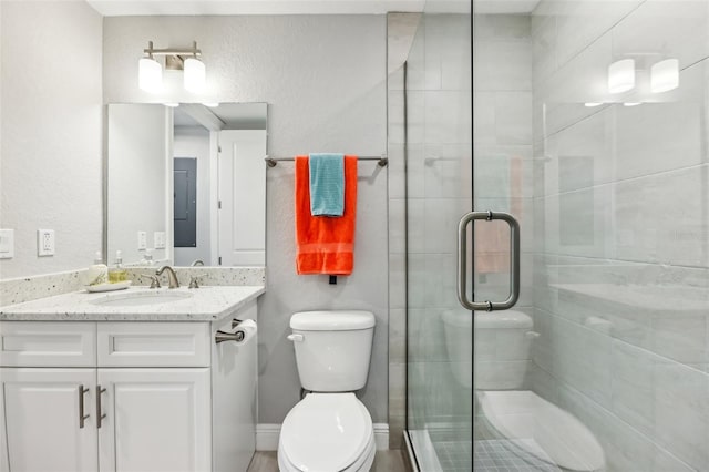 7 Riverwalk Dr Unit 205, New Smyrna Beach, FL 32169 - full bath featuring toilet, a stall shower, and vanity