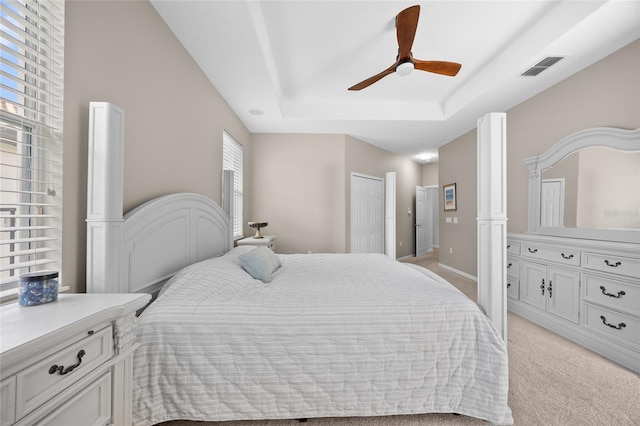 11222 Rapallo Ln, Windermere, FL 34786 - bedroom featuring a raised ceiling, light carpet, and ceiling fan