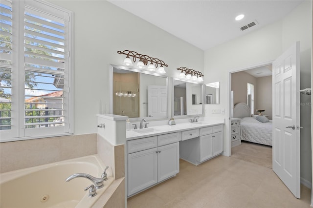11222 Rapallo Ln, Windermere, FL 34786 - bathroom with double vanity, a jetted tub, ensuite bath, tile patterned flooring, and a shower