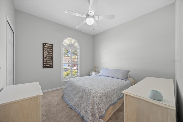 11222 Rapallo Ln, Windermere, FL 34786 - bedroom with light carpet, baseboards, and a ceiling fan