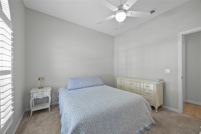 11222 Rapallo Ln, Windermere, FL 34786 - bedroom with light carpet, ceiling fan, and baseboards