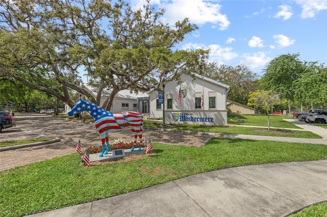 11222 Rapallo Ln, Windermere, FL 34786 - bungalow-style house with a front lawn