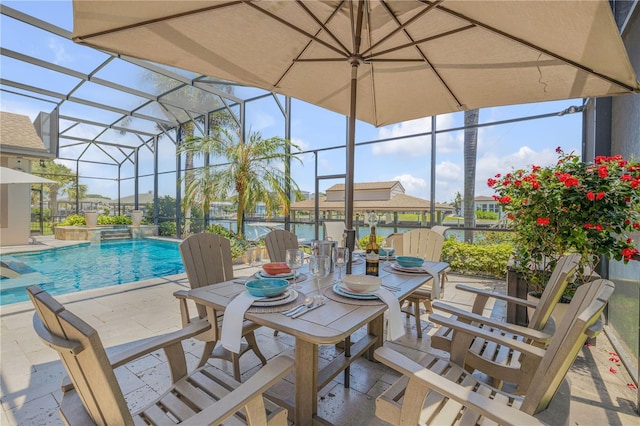 exterior space with glass enclosure and a pool with connected hot tub