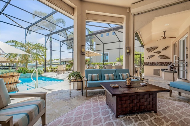 view of patio with a lanai, an outdoor hangout area, and an outdoor pool