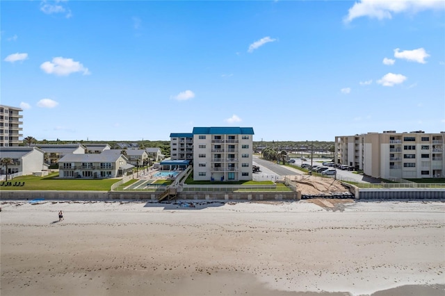 aerial view featuring a view of the beach