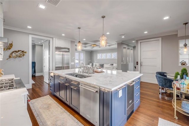 6771 Turtlemound Rd, New Smyrna Beach, FL 32169 - kitchen featuring ornamental molding, stainless steel appliances, visible vents, and a sink