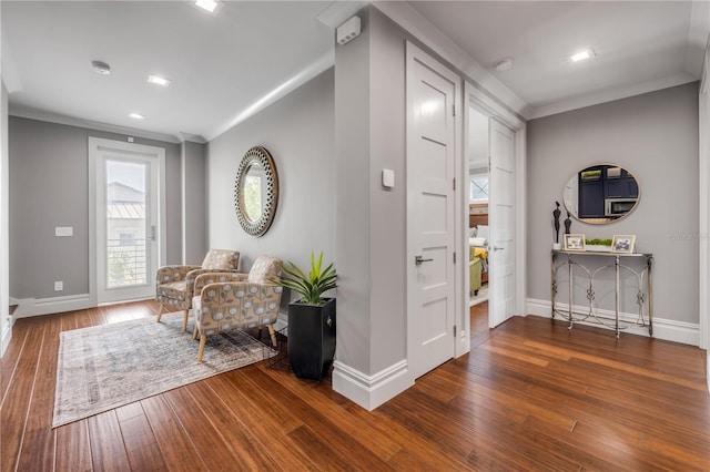 6771 Turtlemound Rd, New Smyrna Beach, FL 32169 - sitting room with ornamental molding, hardwood / wood-style flooring, baseboards, and recessed lighting