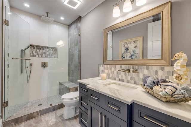 6771 Turtlemound Rd, New Smyrna Beach, FL 32169 - bathroom featuring a stall shower, vanity, toilet, and decorative backsplash