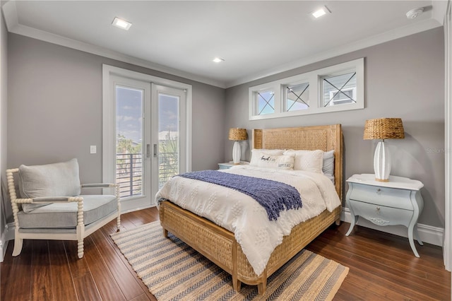 6771 Turtlemound Rd, New Smyrna Beach, FL 32169 - bedroom with crown molding, wood finished floors, access to outside, and baseboards