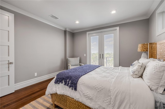 6771 Turtlemound Rd, New Smyrna Beach, FL 32169 - bedroom with french doors, ornamental molding, visible vents, access to outside, and wood finished floors