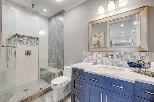 6771 Turtlemound Rd, New Smyrna Beach, FL 32169 - full bath with a tile shower, tasteful backsplash, toilet, and vanity