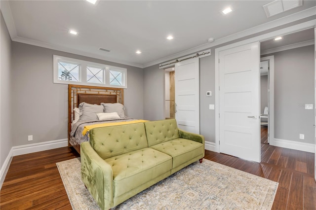 6771 Turtlemound Rd, New Smyrna Beach, FL 32169 - bedroom with ornamental molding, a barn door, baseboards, and wood finished floors