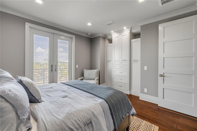 6771 Turtlemound Rd, New Smyrna Beach, FL 32169 - bedroom with french doors, recessed lighting, crown molding, dark wood-type flooring, and access to exterior