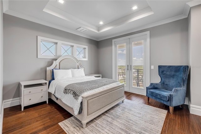 6771 Turtlemound Rd, New Smyrna Beach, FL 32169 - bedroom with a tray ceiling, baseboards, visible vents, access to outside, and hardwood / wood-style floors