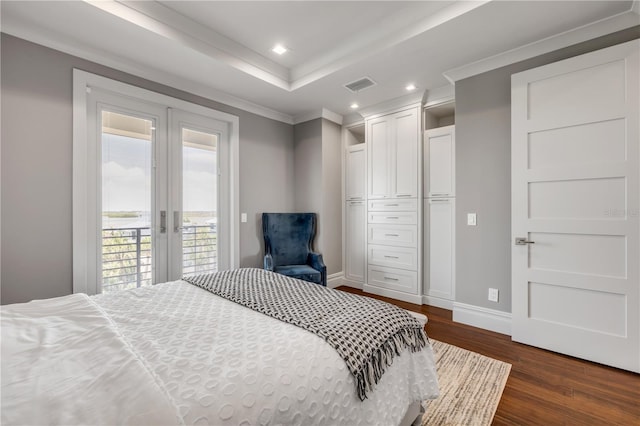 6771 Turtlemound Rd, New Smyrna Beach, FL 32169 - bedroom featuring french doors, dark wood finished floors, visible vents, baseboards, and access to outside