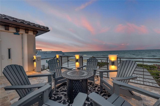 6771 Turtlemound Rd, New Smyrna Beach, FL 32169 - balcony with a water view and a fire pit