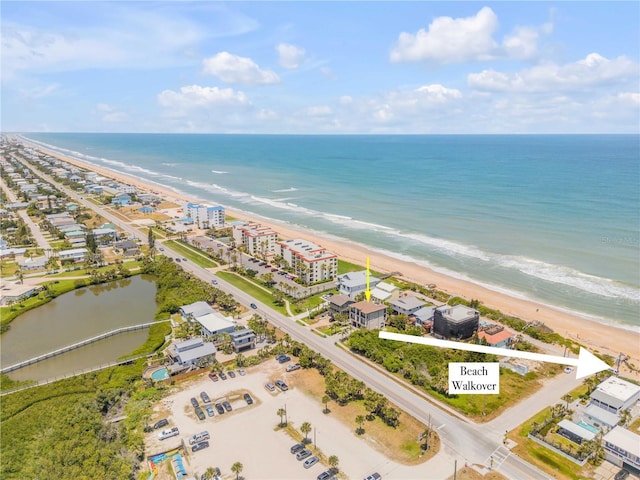 6771 Turtlemound Rd, New Smyrna Beach, FL 32169 - bird's eye view featuring a beach view and a water view