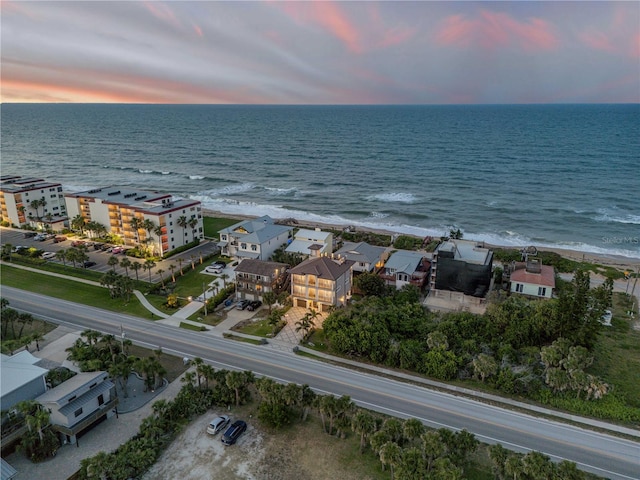 6771 Turtlemound Rd, New Smyrna Beach, FL 32169 - aerial view at dusk with a water view and a beach view