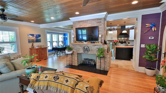 508 Faulkner St, New Smyrna Beach, FL 32168 - living room featuring ornamental molding, plenty of natural light, ceiling fan, wooden ceiling, and light wood-type flooring