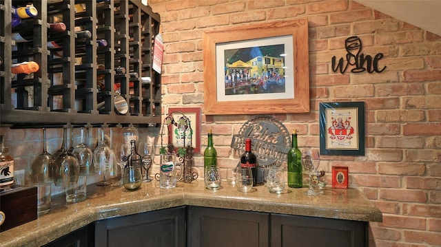 508 Faulkner St, New Smyrna Beach, FL 32168 - wine cellar featuring brick wall and bar