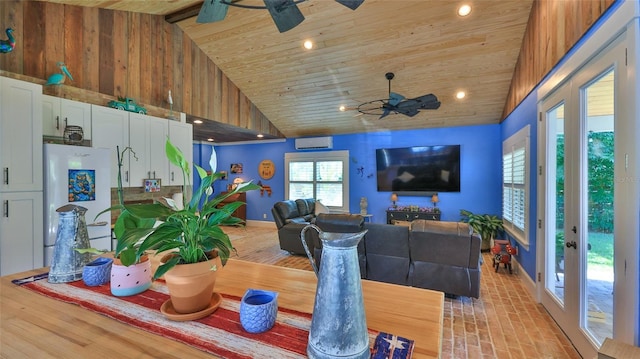 508 Faulkner St, New Smyrna Beach, FL 32168 - dining area with vaulted ceiling, wood ceiling, ceiling fan, a wall unit AC, and recessed lighting