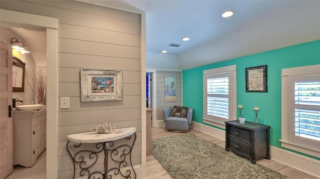 508 Faulkner St, New Smyrna Beach, FL 32168 - bathroom with vanity, wood finished floors, recessed lighting, and baseboards