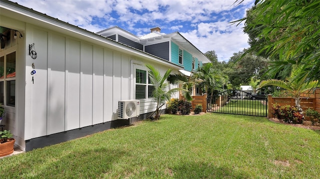 508 Faulkner St, New Smyrna Beach, FL 32168 - view of yard featuring a cooling unit and a gate
