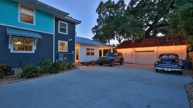 508 Faulkner St, New Smyrna Beach, FL 32168 - view of front of property featuring a garage and concrete driveway