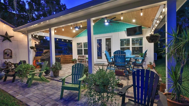 508 Faulkner St, New Smyrna Beach, FL 32168 - patio at twilight with a patio, ceiling fan, and french doors