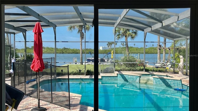 34 Richmond Dr, New Smyrna Beach, FL 32169 - outdoor pool featuring a water view, a lanai, and an in ground hot tub