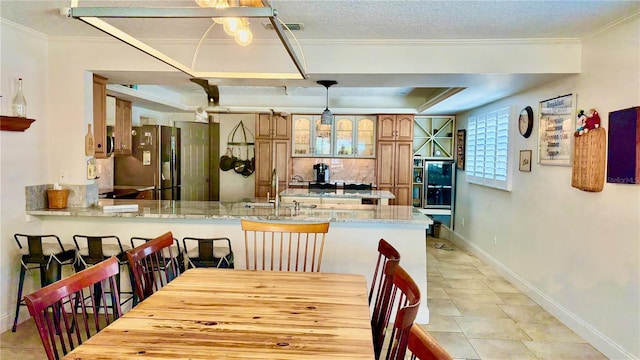 34 Richmond Dr, New Smyrna Beach, FL 32169 - dining space with light tile patterned flooring, baseboards, and visible vents