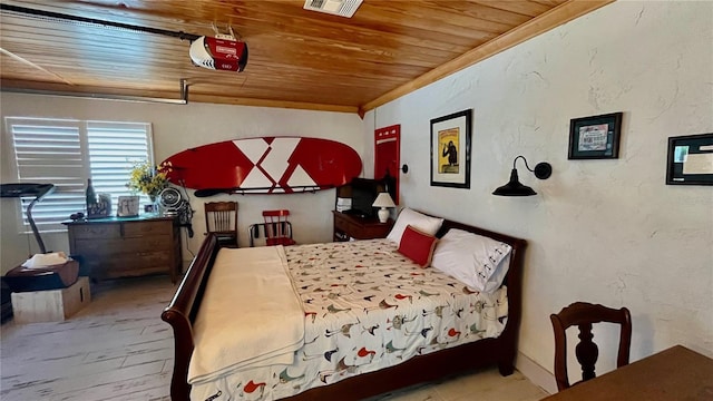 34 Richmond Dr, New Smyrna Beach, FL 32169 - bedroom with visible vents, wooden ceiling, and a textured wall