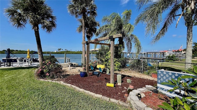 34 Richmond Dr, New Smyrna Beach, FL 32169 - view of yard featuring fence and a water view