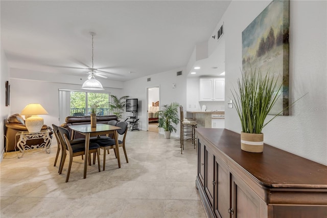 dining area with ceiling fan