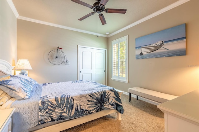 bedroom with crown molding, carpet floors, baseboards, and a ceiling fan
