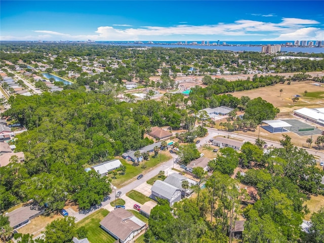 bird's eye view with a water view and a residential view