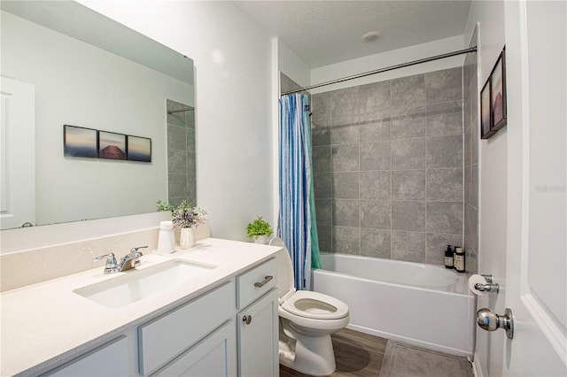 bathroom with vanity, toilet, and shower / tub combo with curtain