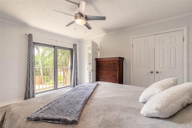 bedroom featuring crown molding, a textured ceiling, a closet, and a ceiling fan