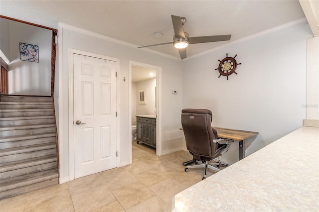 office featuring a ceiling fan, crown molding, and light tile patterned floors