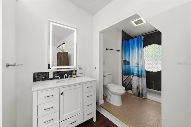 full bathroom with a shower with curtain, visible vents, tasteful backsplash, vanity, and toilet